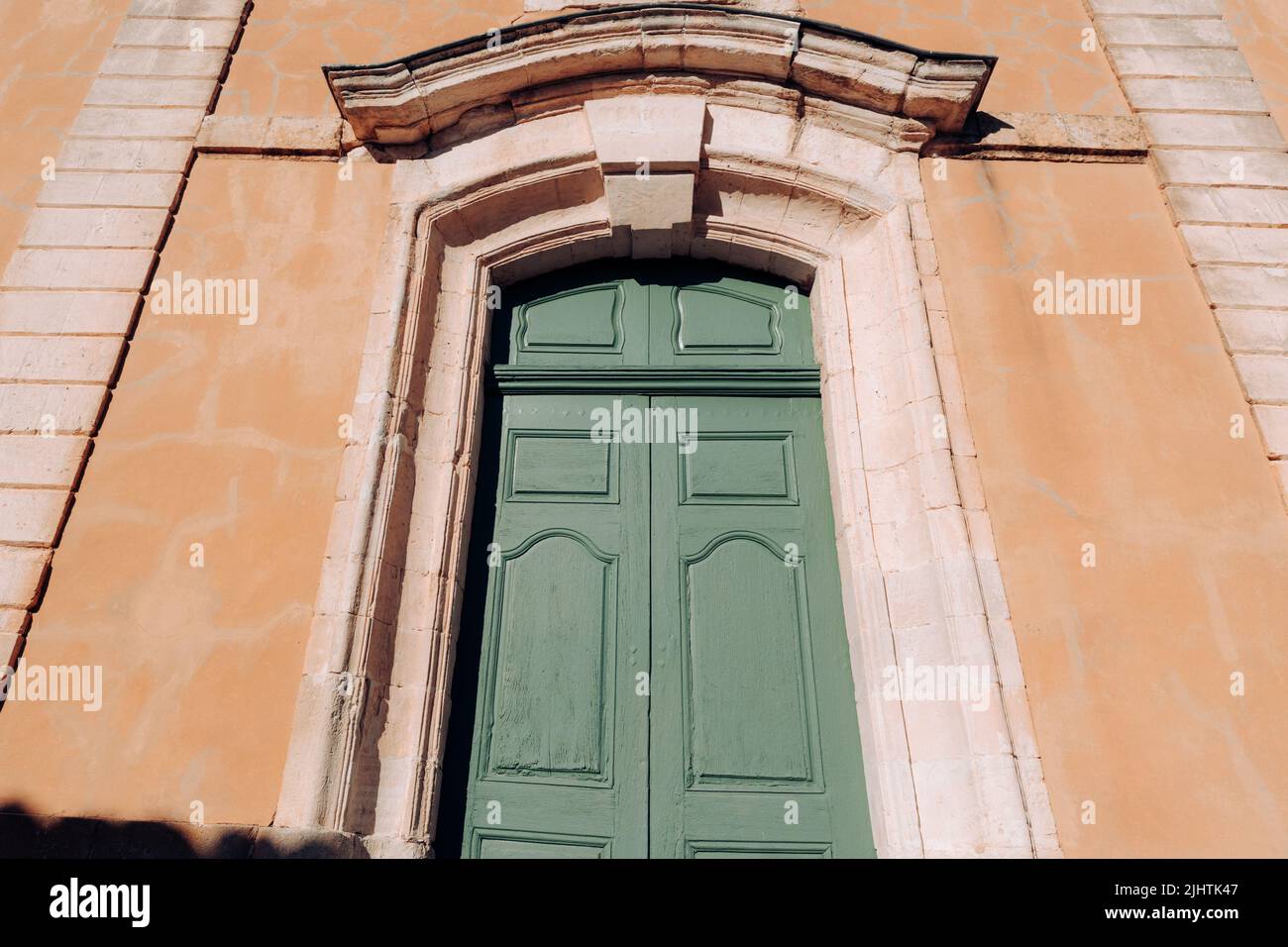 Vintage porta in legno e sfondo parete Foto Stock
