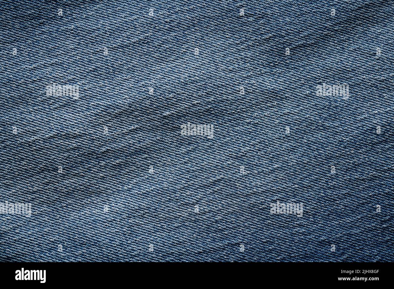 Jeans blu ecologici che possono essere utilizzati come sfondo che copre completamente lo schermo Foto Stock