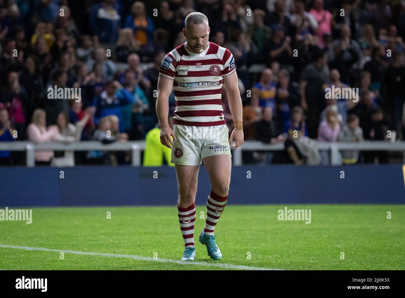 Un abbattuto Liam Marshall #5 dei Guerrieri Wigan a tempo pieno dopo aver perso 42-12 a Leeds Foto Stock
