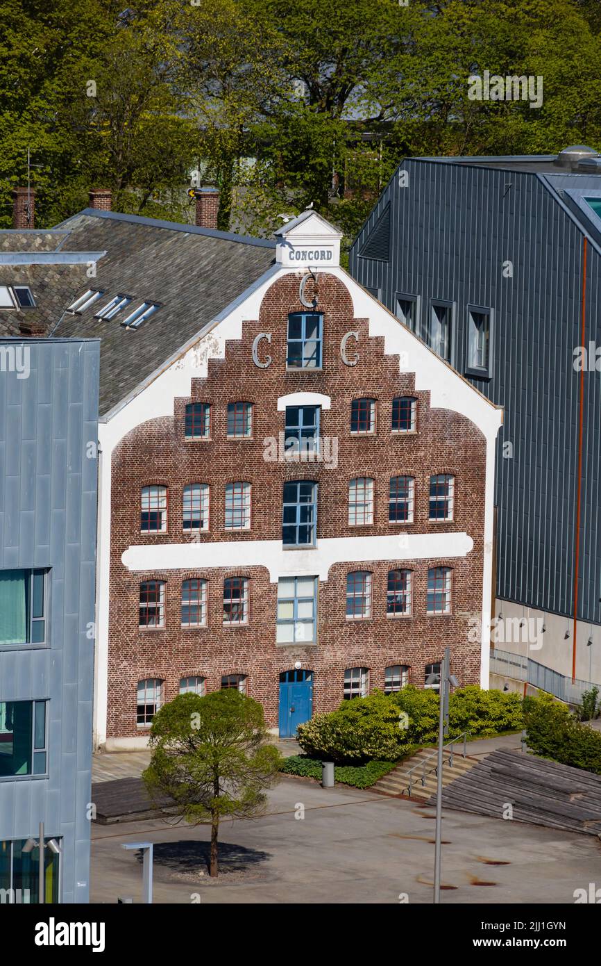 Vecchio magazzino, Concord, CCC edificio sulla banchina del porto di Stavanger, Norvegia. Ora uno studio di musica di prova open space. Foto Stock