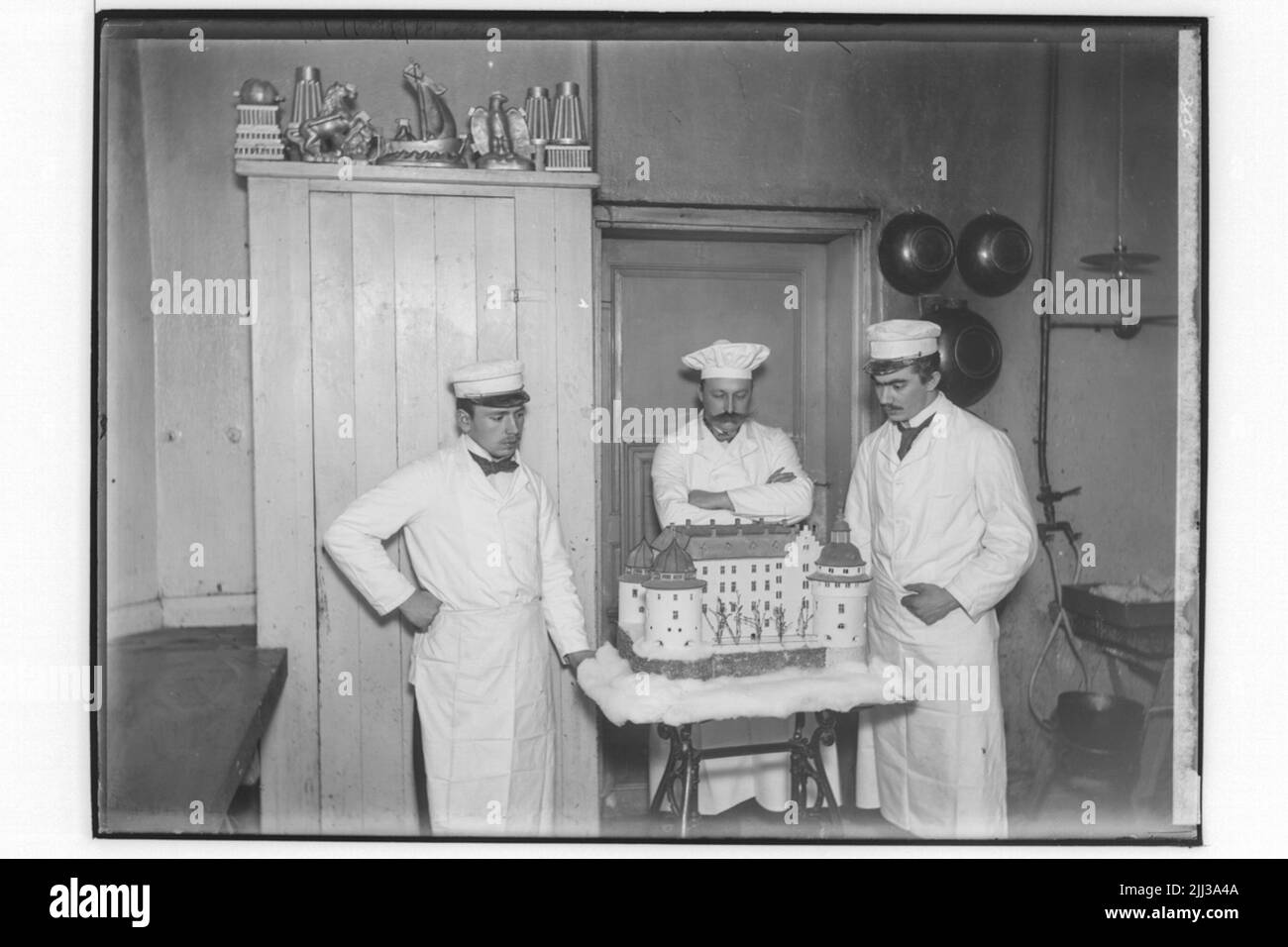 Pasticceria interna, 3 persone, pasticcere Gottfrid Myrin. Modello di Castello di Örebro. Foto Stock