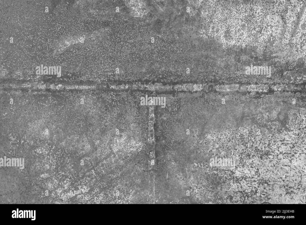 Lavorazione saldatura di processo scorie industria acciaio vecchio grigio metallo lavoro trama fondo. Foto Stock