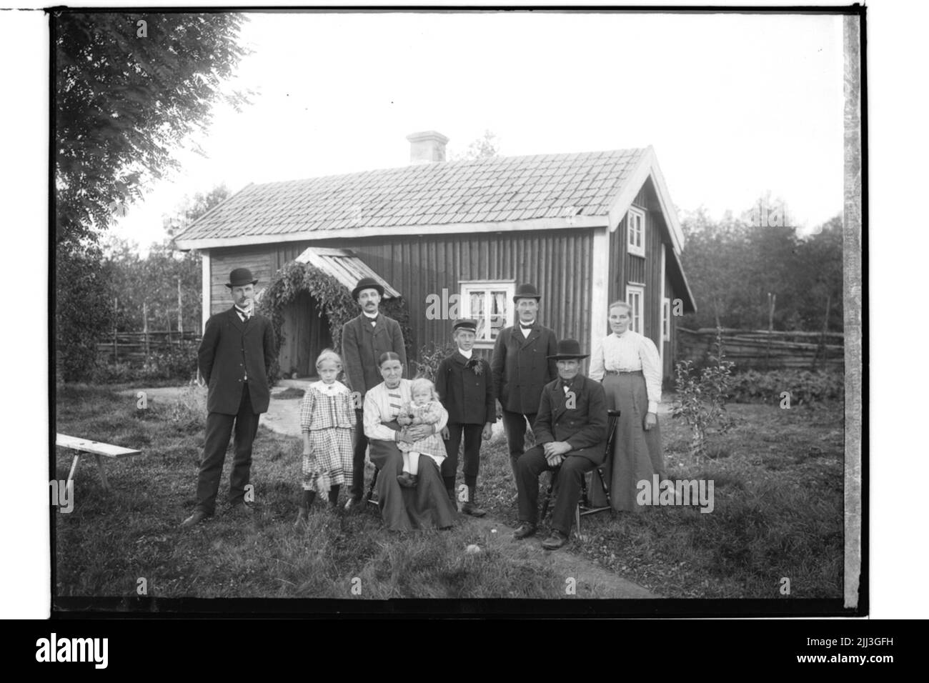 Cottage singolo a un piano con estensione, 9 People.Erik Gustafsson Foto Stock