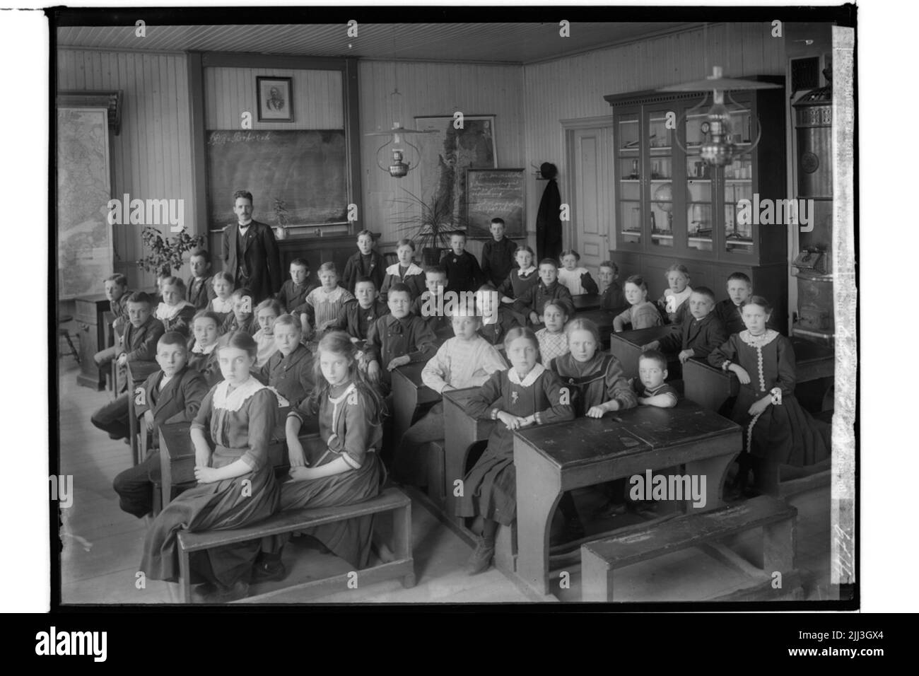 Pålsboda scuola, scuola interna, scolari con insegnanti Frans Dahlander. Foto Stock