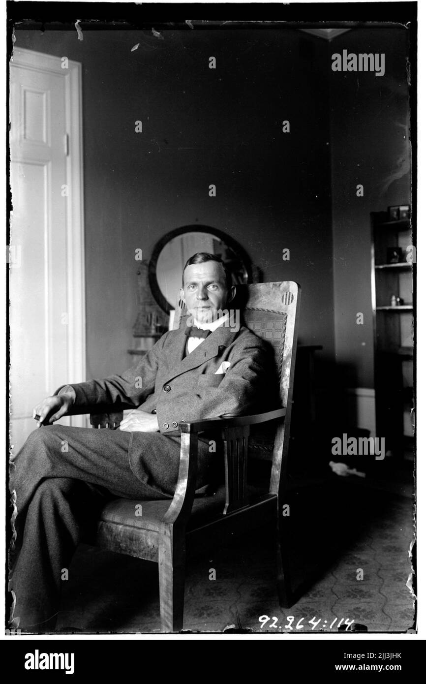 Hålahult sanatorium, l'uomo in tuta siede sulla sedia Foto Stock