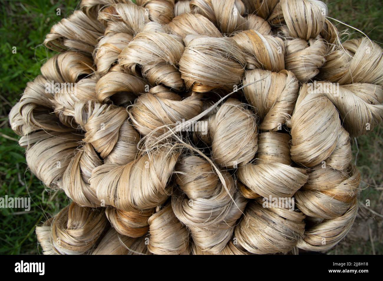 Spesso bruno fascio di fibra di iuta grezza trama sfondo Foto Stock