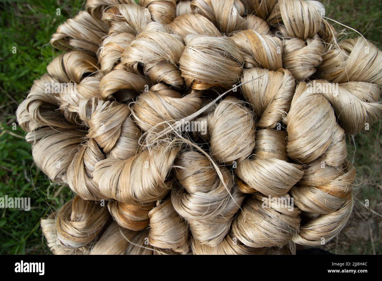 Spesso bruno fascio di fibra di iuta grezza trama sfondo Foto Stock