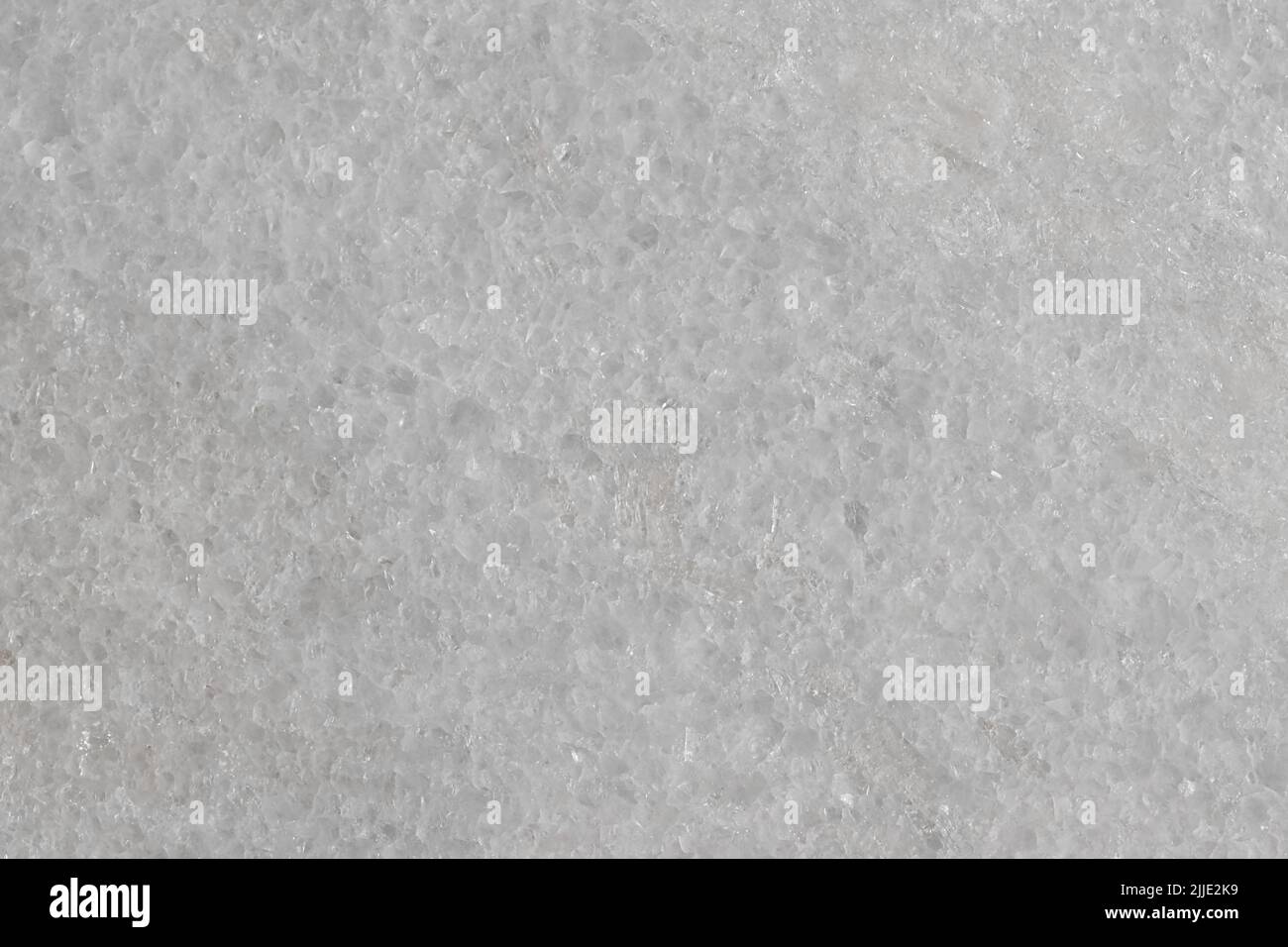 Piastrelle in pietra naturale di colore grigio chiaro con graffi e effetto marmo. Foto Stock