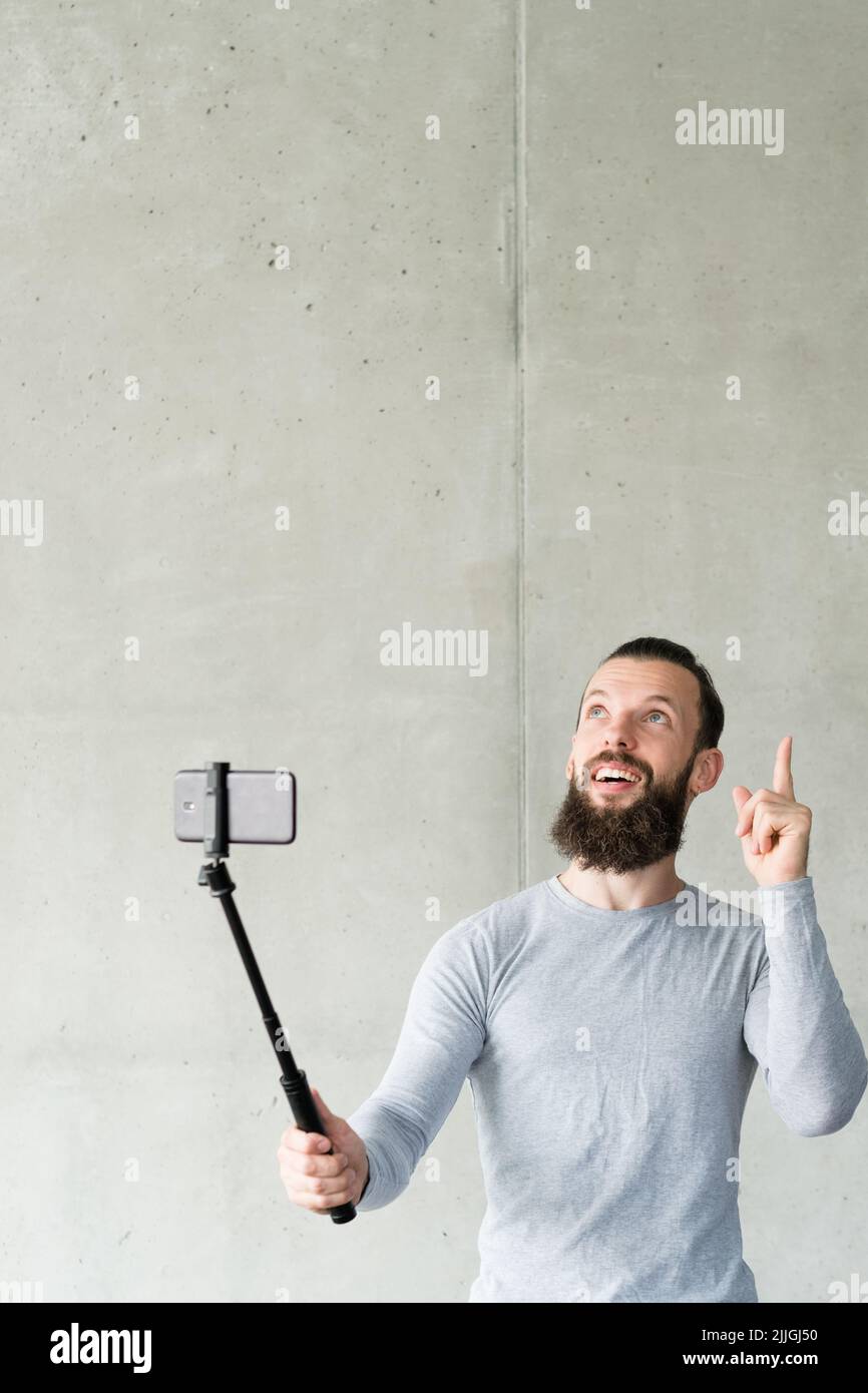 allenatore online uomo smartphone carriera top Foto Stock