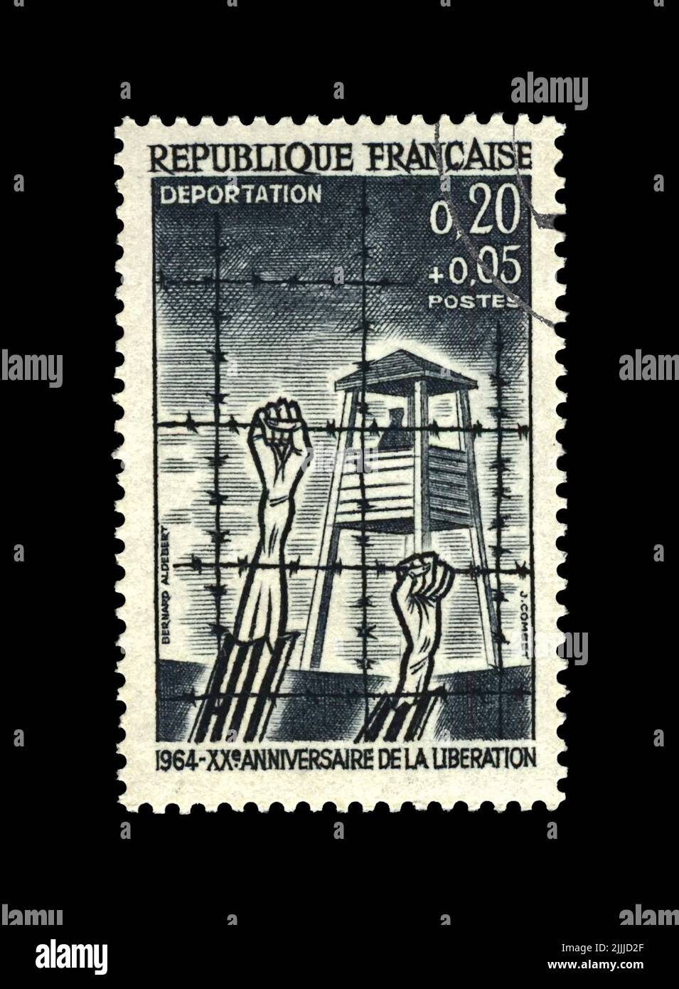 Liberazione del campo di concentramento, vittima mani umane sotto cavo spinato filo, 20th anniversario, CIRCA 1964. vintage post timbro stampato in FRANCIA. Foto Stock