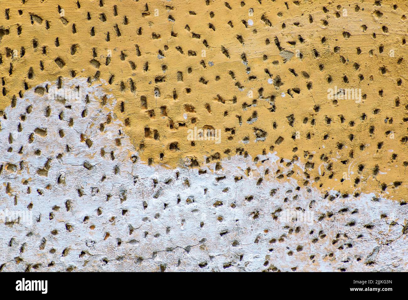 Un primo piano di una texture a due tonalità con molti graffi Foto Stock