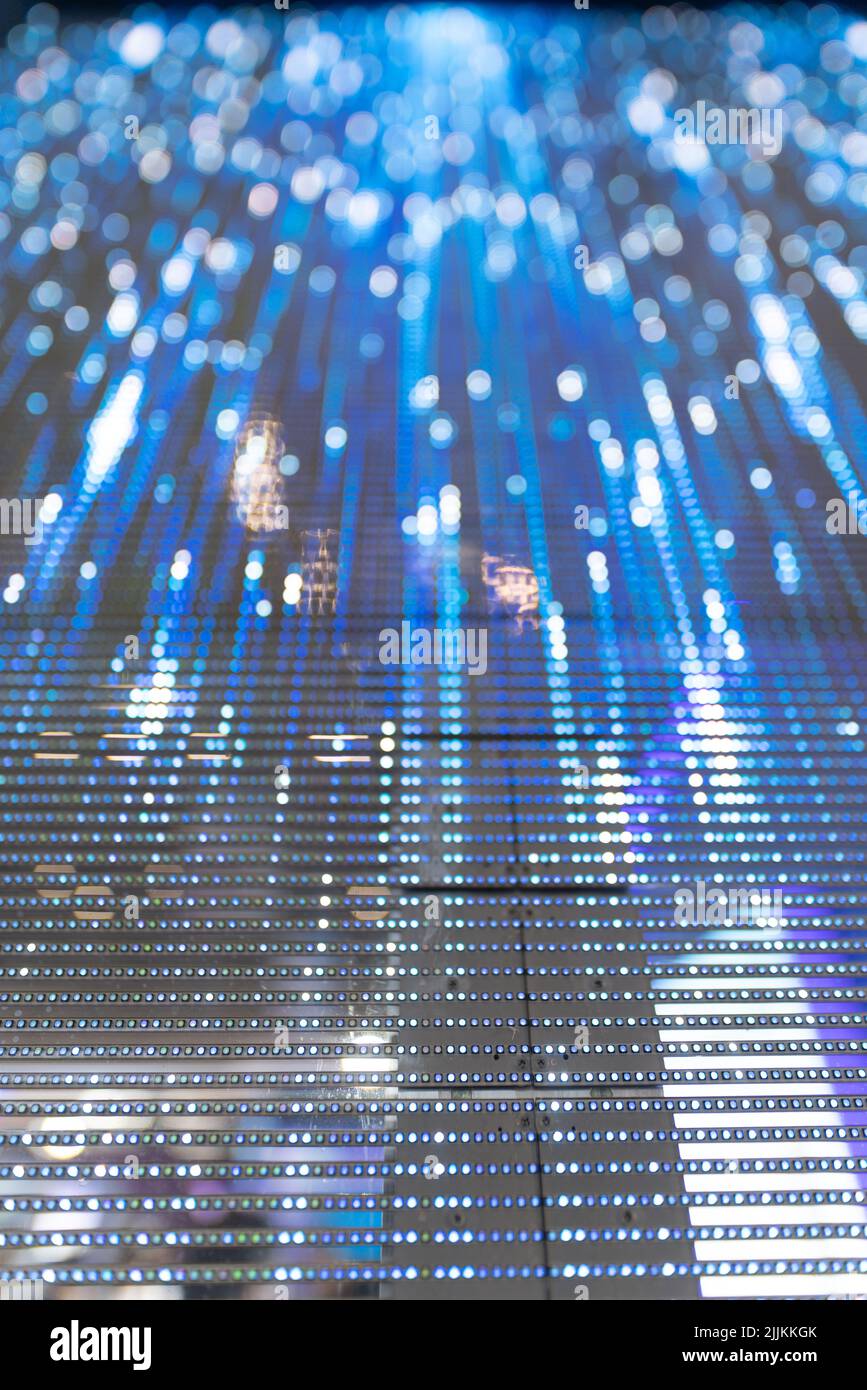 A motion blurred flash light of data and information transfer concept created with LED lights board Foto Stock