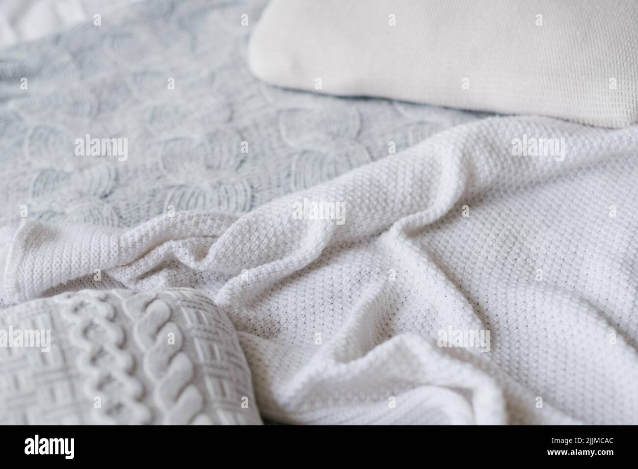 assortimento di coperte in maglia, texture artigianale fatta a mano Foto Stock