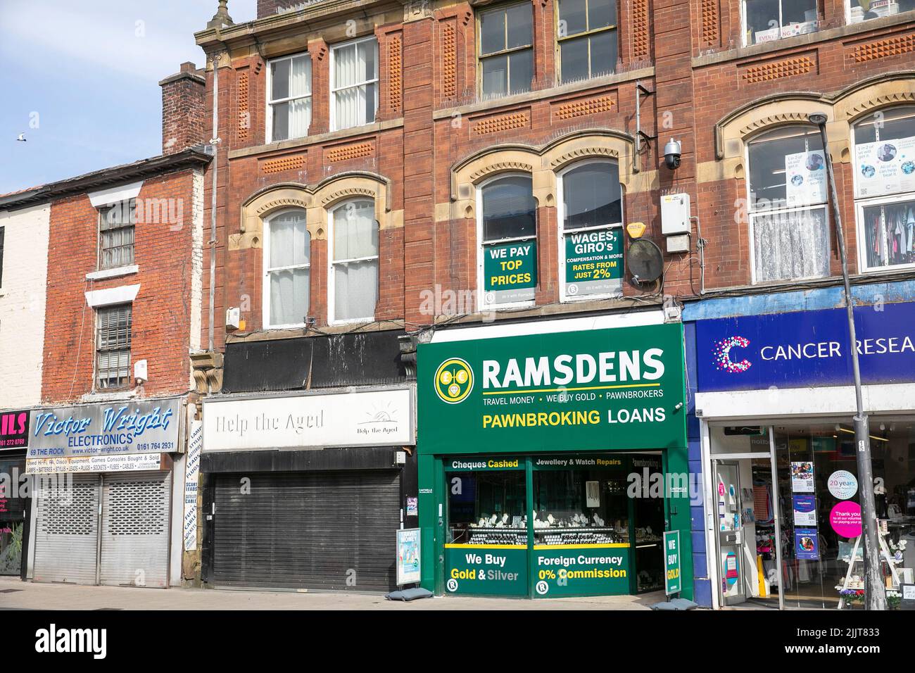 Ramsdens negozio di pawnbroking e negozio di prestiti nella zona commerciale Rock di Bury, città di Manchester Lancashire, Inghilterra, Regno Unito Foto Stock