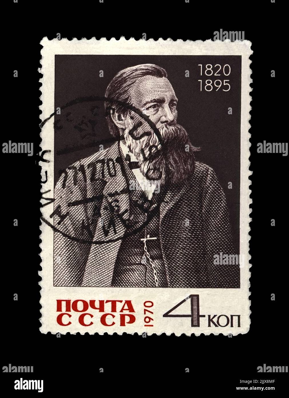 Friedrich Engels (1820-1895), famoso leader politico, circa 1970. Francobollo postale cancellato stampato in URSS isolato su sfondo nero. Foto Stock