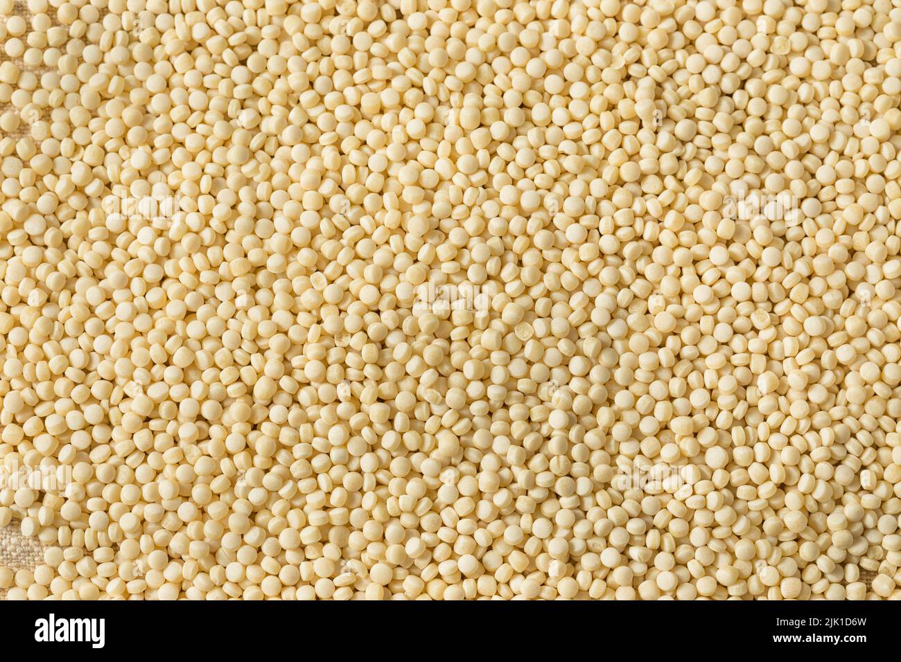 Materie organico secco il cous cous in una ciotola Foto Stock