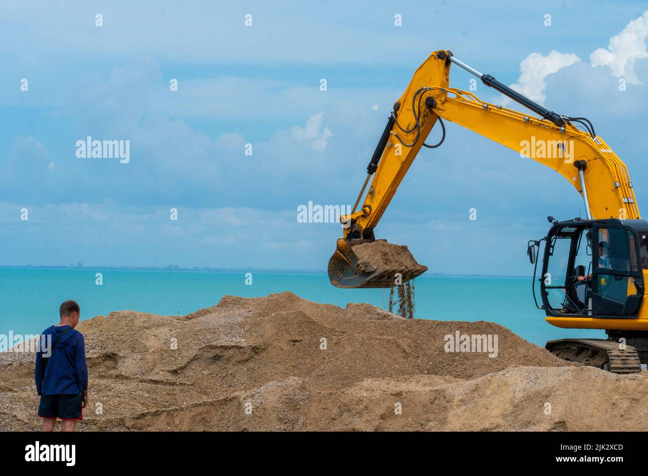Sea building escavatore demolitore macchine demolizioni industria macchinari natura industriale, dalla struttura delle polveri in tecnologia ed estrazione Foto Stock