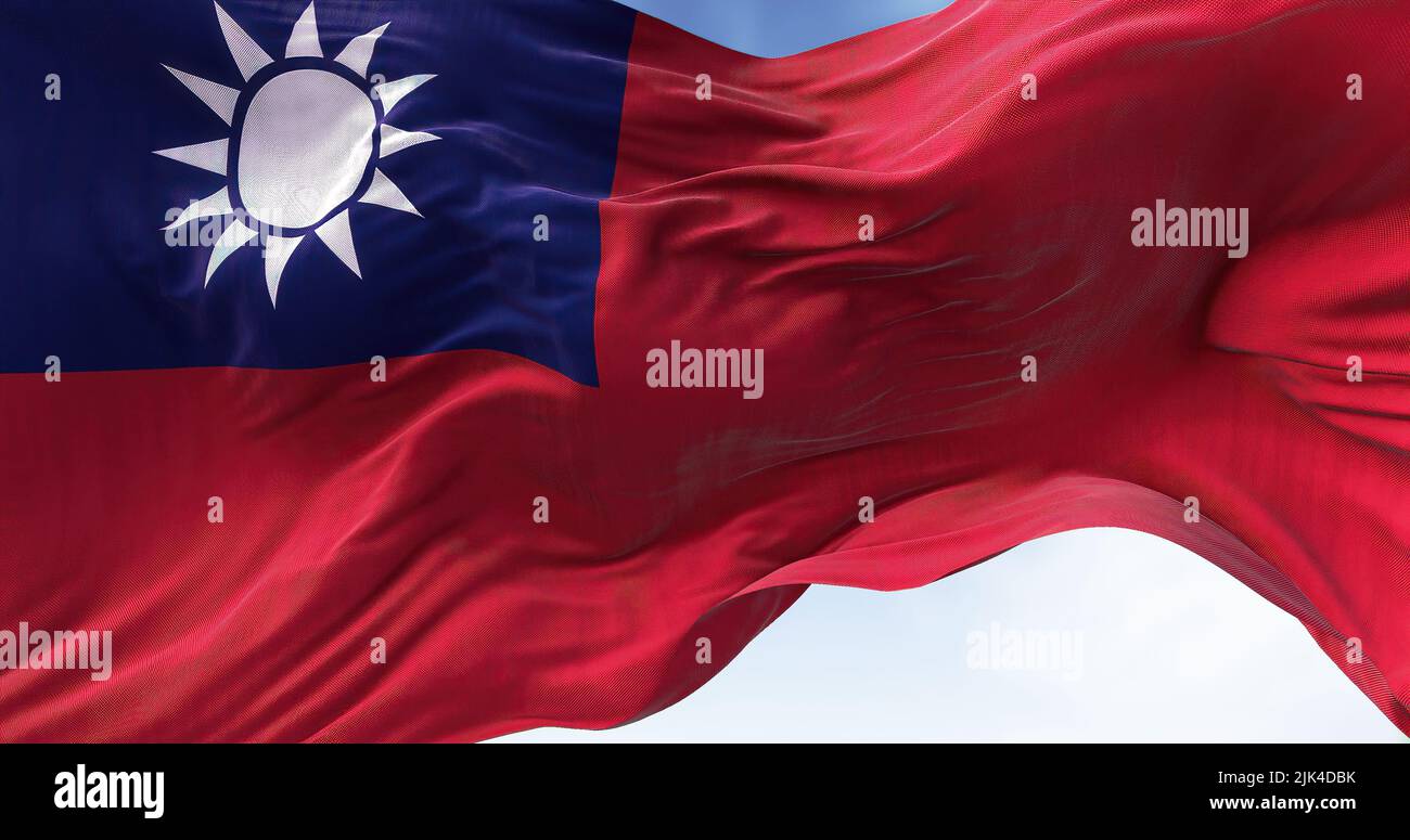 Vista ravvicinata della bandiera taiwanese che sventola nel vento. Taiwan, ufficialmente Repubblica di Cina, è un paese dell'Asia orientale Foto Stock