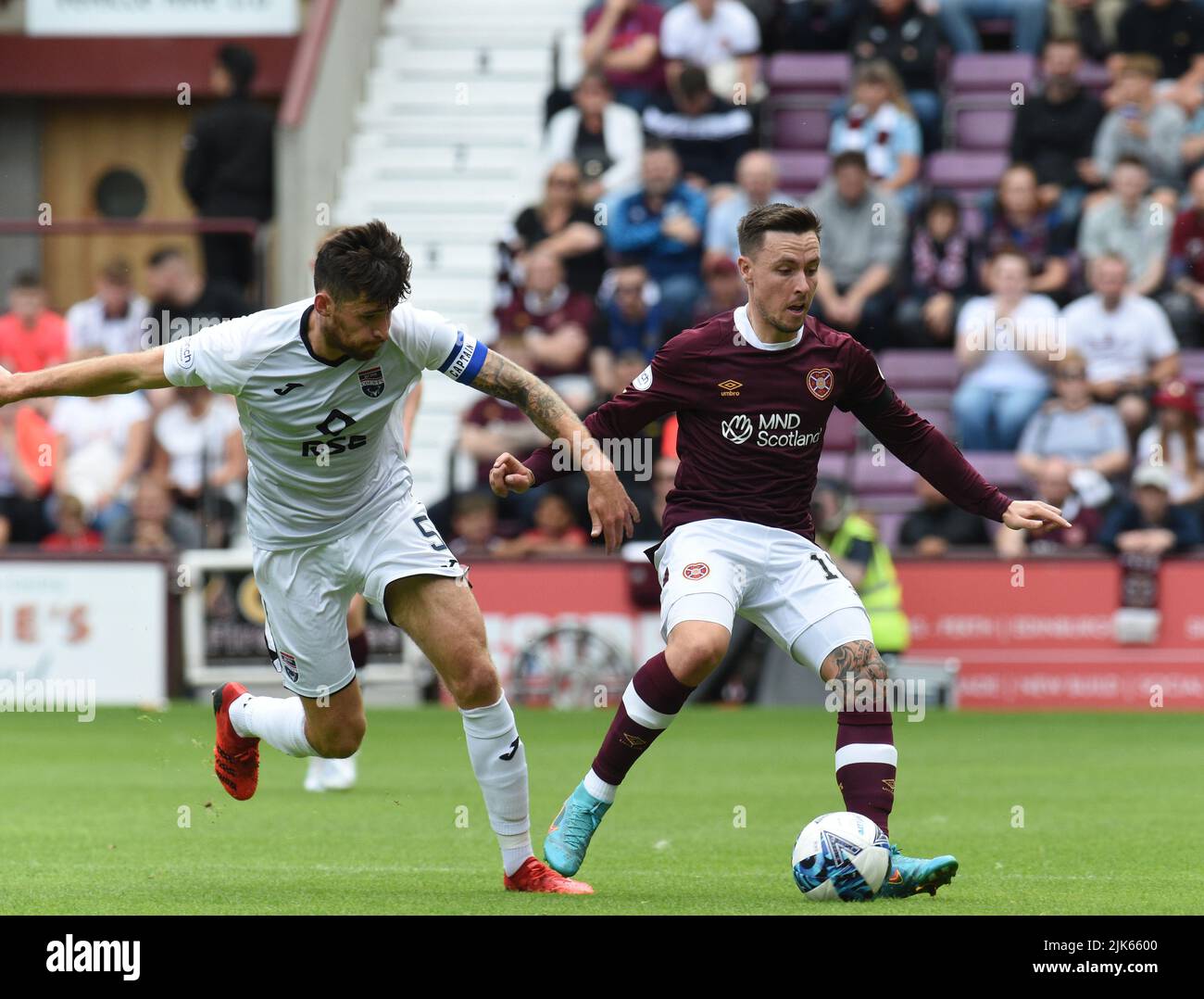 Tynecastle Park, Edinburgh.Scotland UK.30.July 22 Hearts vs Ross County Cinch Scottish Premier Match . Hearts' Barrie McKay & Jack Baldwin Ross County .(L) Credit: eric Mccowat/Alamy Live News Foto Stock