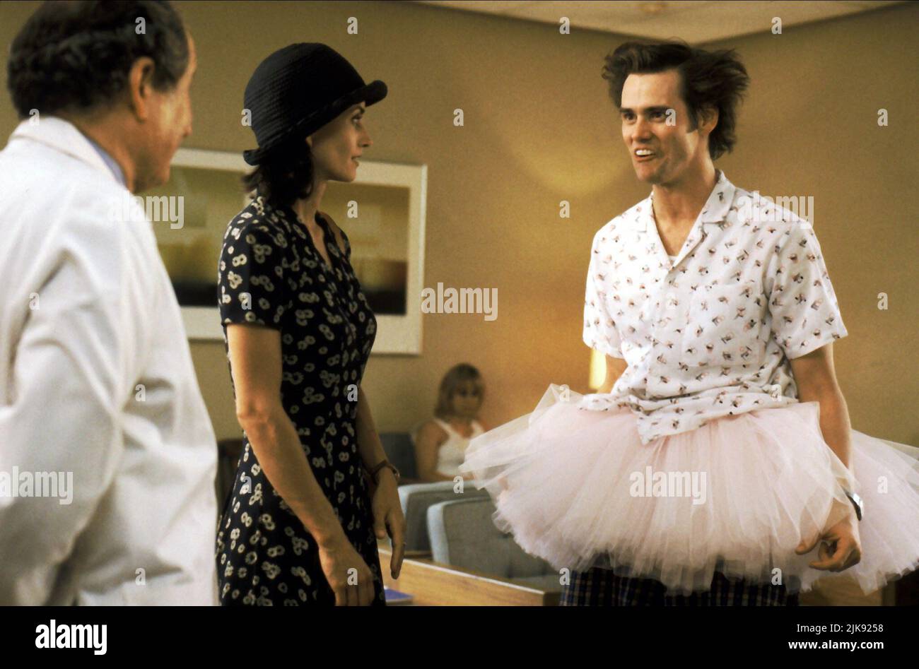 Courteney Cox & Jim Carrey Film: ACE Ventura: PET Detective (USA 1994) personaggi: Melissa Robinson, Ace Ventura regista: Tom Shadyac 04 Febbraio 1994 **ATTENZIONE** questa foto è solo per uso editoriale ed è copyright di MORGAN CREEK ENTERTAINMENT e/o del fotografo assegnato dalla Film or Production Company e può essere riprodotta solo da pubblicazioni in concomitanza con la promozione del suddetto Film. È richiesto un credito obbligatorio per L'INTRATTENIMENTO MORGAN CREEK. Il fotografo deve essere accreditato anche quando è noto. Nessun uso commerciale può essere concesso senza autorizzazione scritta fra Foto Stock