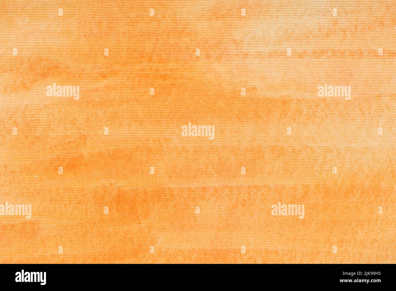 acquerello dipinto di arancione chiaro su tessuto di sfondo della carta Foto Stock