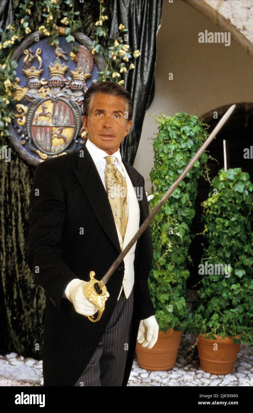 George Hamilton Film: HART to Hart: Till Death Do US Hart (TV-Film) personaggi: Karl von Ostenberg USA 1996, regista: Tom Mankiewicz 25 agosto 1996 **AVVISO** questa fotografia è solo per uso editoriale ed è il copyright di COLUMBIA PICTURES TELEVISION E/o il fotografo assegnato dalla Film o Production Company e può essere riprodotto solo da pubblicazioni in concomitanza con la promozione del suddetto Film. È richiesto un credito obbligatorio per LA TELEVISIONE COLUMBIA. Il fotografo deve essere accreditato anche quando è noto. Nessun uso commerciale può essere concesso senza autorizzazione scritta fr Foto Stock