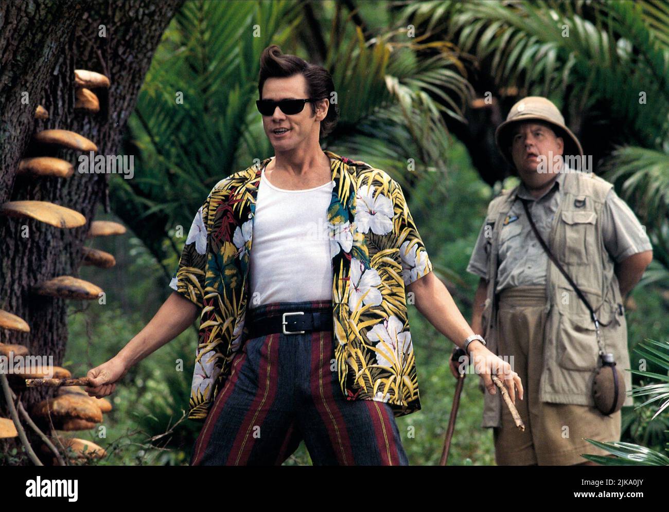 Jim Carrey & Ian Mcneice Film: ACE Ventura: Quando la natura chiama (USA 1995) personaggi: ACE Ventura, Fulton Greenwall regista: Steve Oedekerk 08 novembre 1995 **AVVISO** questa fotografia è solo per uso editoriale ed è copyright di MORGAN CREEK ENTERTAINMENT e/o del fotografo assegnato dalla Film or Production Company e può essere riprodotta solo da pubblicazioni in concomitanza con la promozione del suddetto Film. È richiesto un credito obbligatorio per L'INTRATTENIMENTO MORGAN CREEK. Il fotografo deve essere accreditato anche quando è noto. Nessun uso commerciale può essere concesso senza autorizzazione scritta Foto Stock