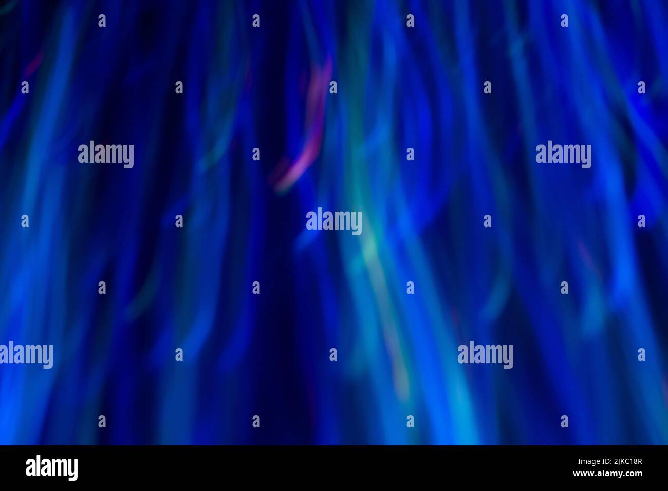 sfocatura linee ondulate al neon luci sfocate Foto Stock