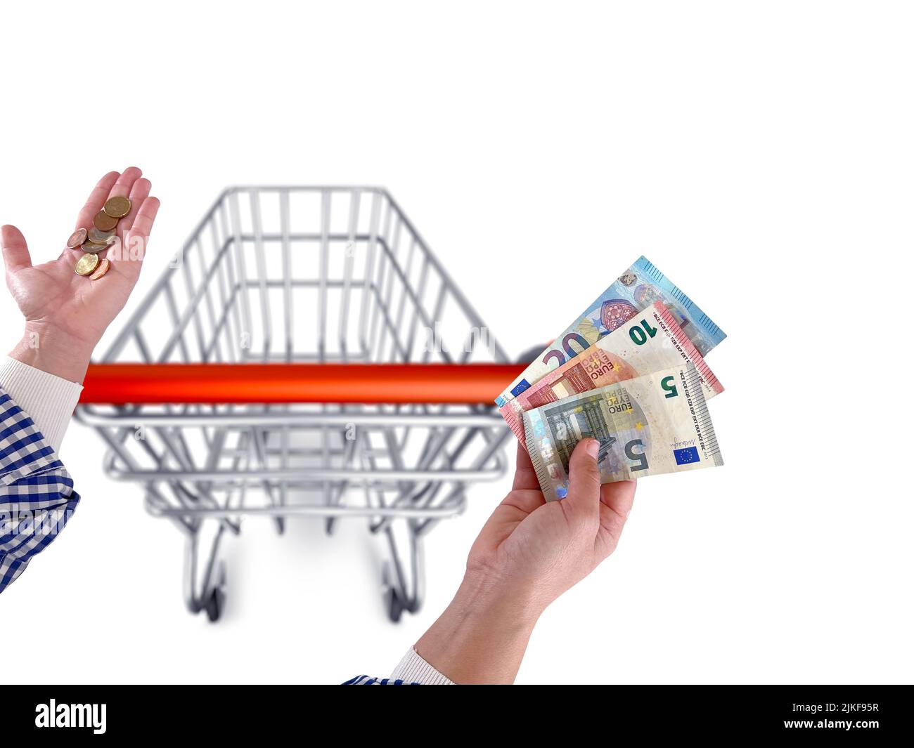 Still life of shopping cart and euro Notes on white background - stock photo Foto Stock