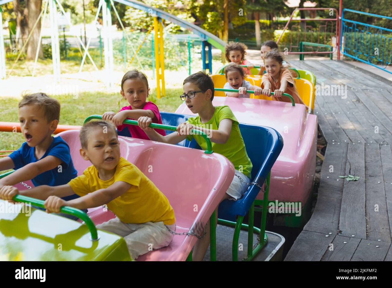 Children riding roller coaster in immagini e fotografie stock ad alta  risoluzione - Alamy