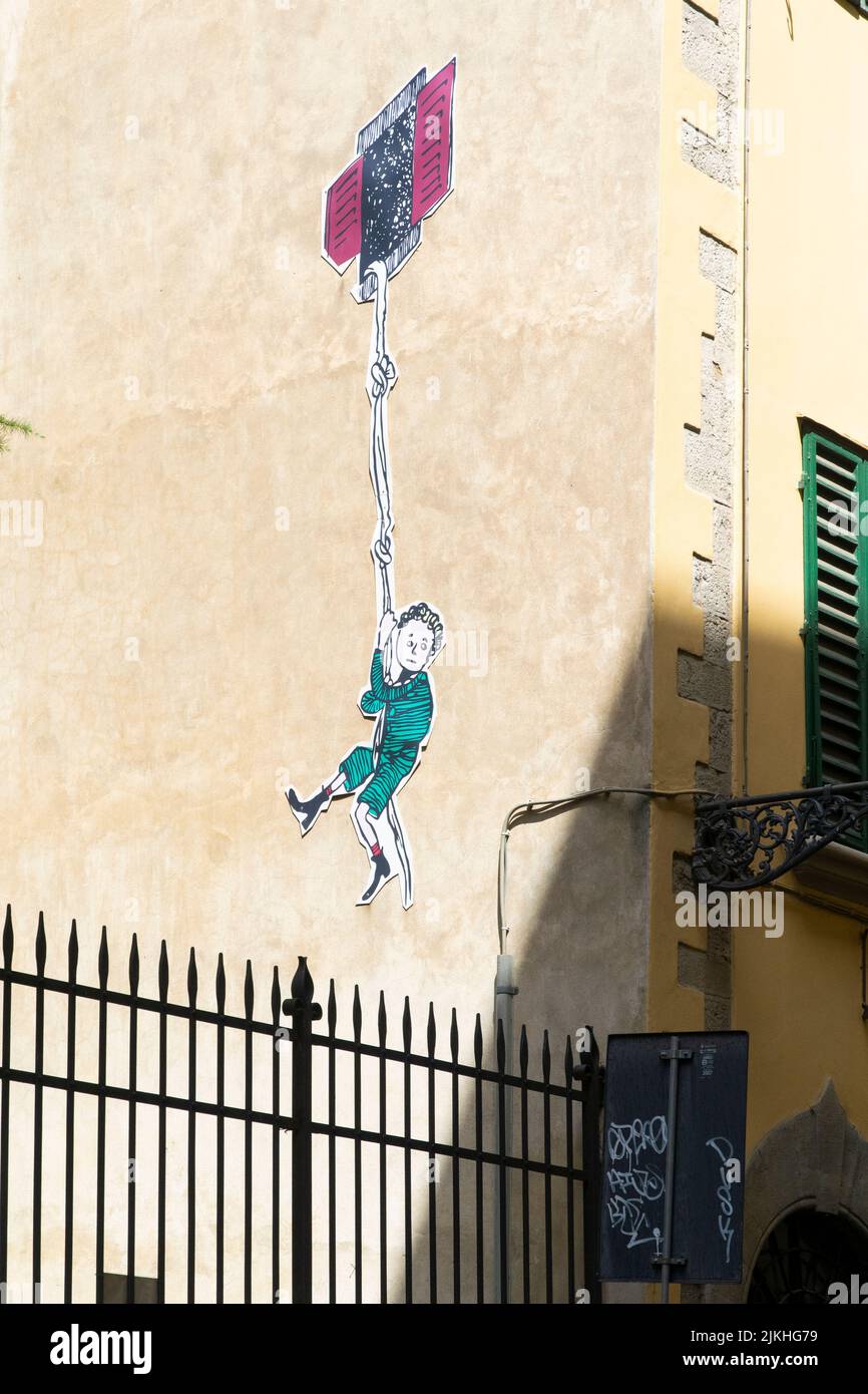 Graffitti su un muro di cinta nel centro di Firenze, Italia Foto Stock