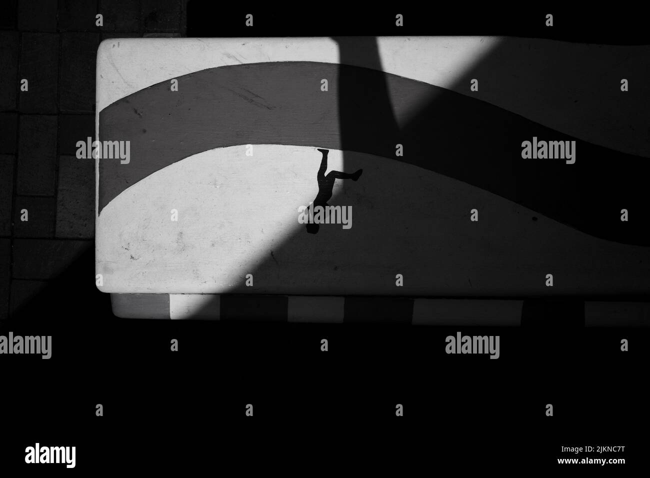 Un dipinto di una persona che corre sul muro a Taupo, Nuova Zelanda Foto Stock