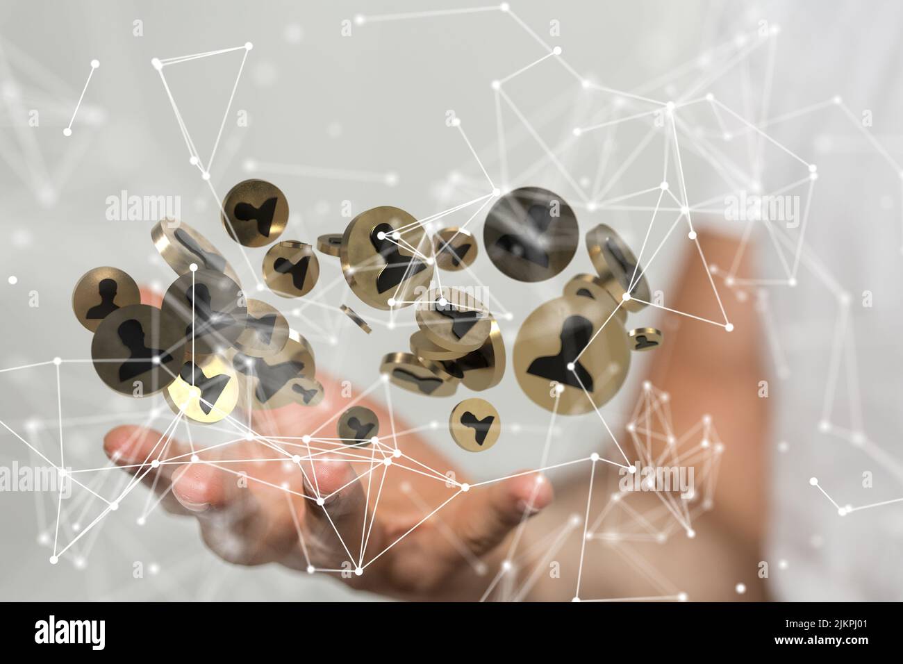 Una rappresentazione 3D di figure umane in cerchi dorati connessi con reti neurali che galleggiano sopra una mano Foto Stock