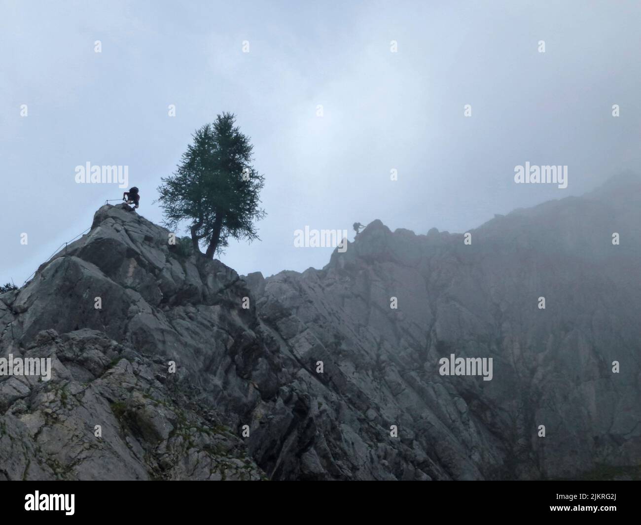 Scalatore a Seebenklettersteig via ferrata, Tirolo, Austria in estate Foto Stock