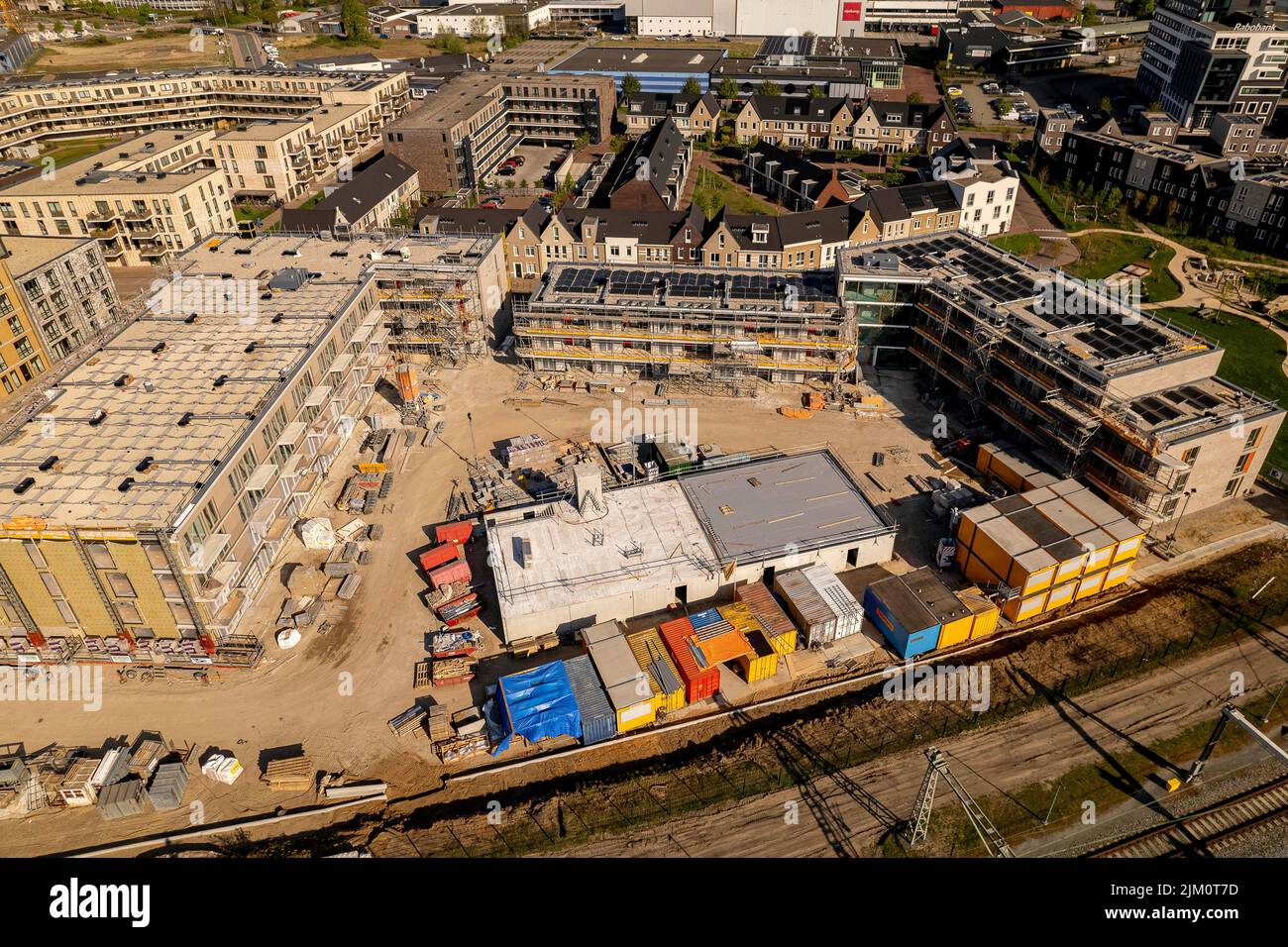 Luminoso veduta aerea del cantiere di costruzione a Zutphen di investimento immobiliare e mercato immobiliare sociale progetto di costruzione collettiva. Foto Stock