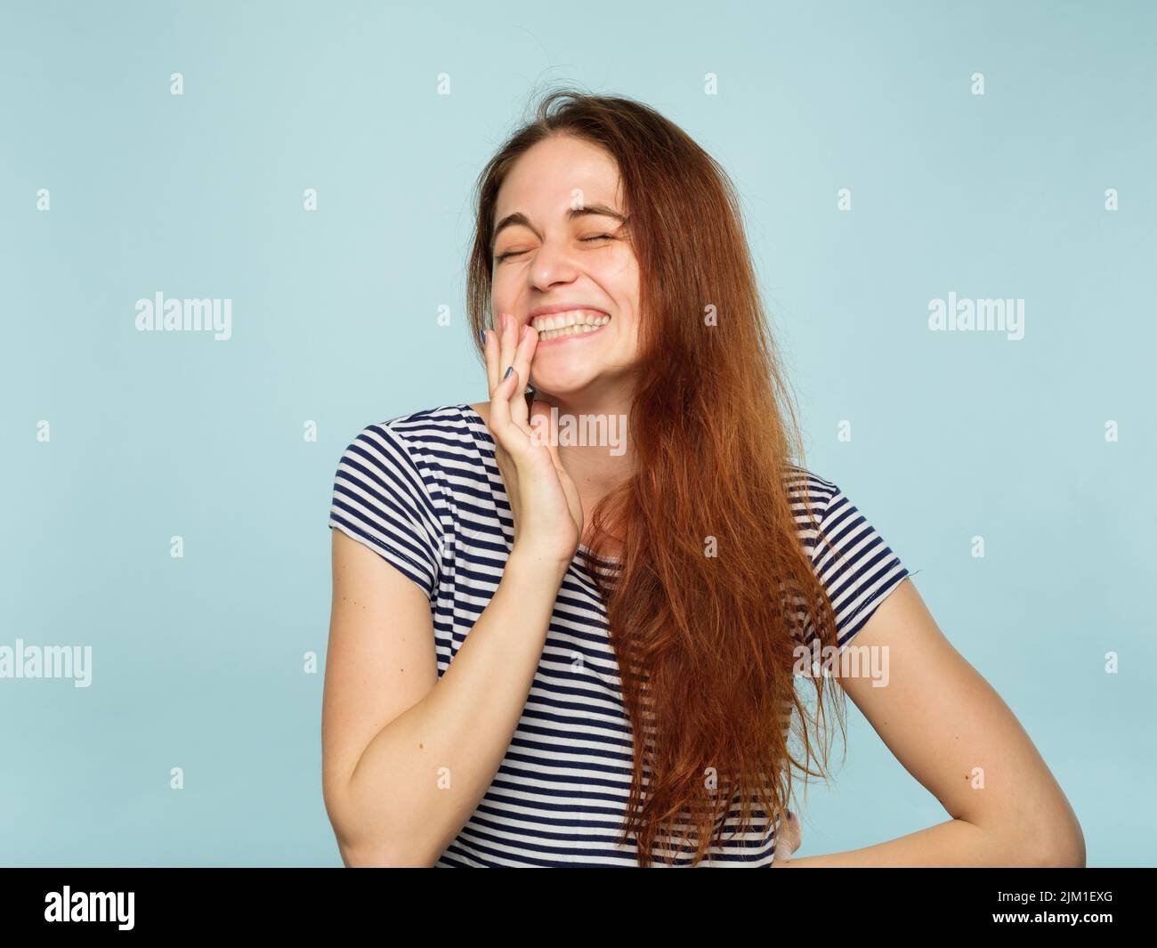 emotion faccia felice gioia entusiasta ragazza che raggiano il sorriso Foto Stock