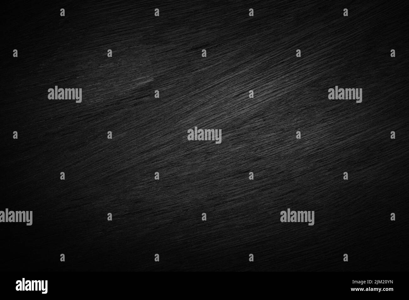 texture di una tavola di legno. sfondo nero scuro testurizzato. design moderno sfondo copia spazio Foto Stock