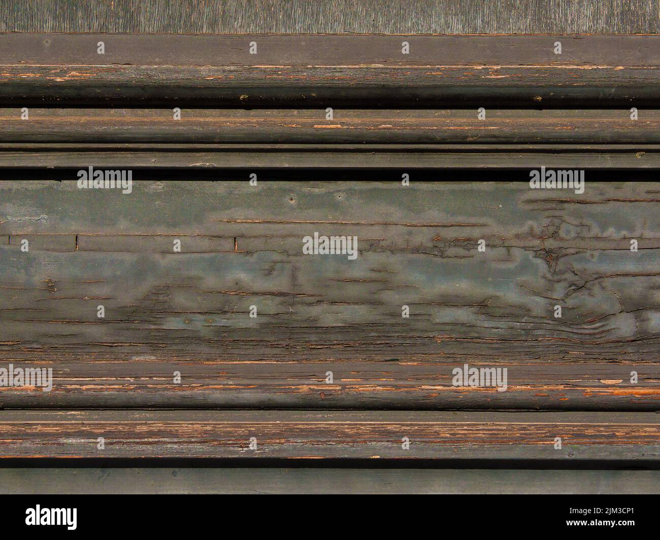 Vecchia porta di legno con vernice usurata come sfondo Foto Stock