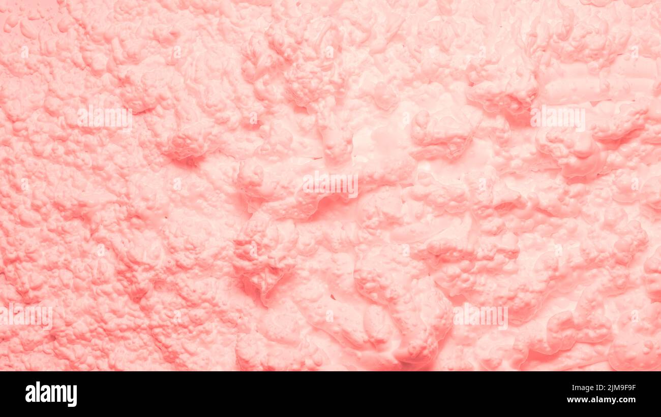 corallo rosso schiuma texture sfondo gorgogliato crema Foto Stock