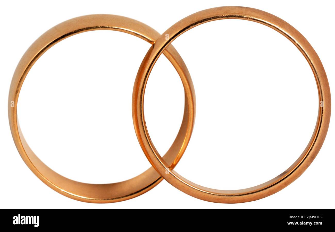 Matrimonio di due anelli d oro isolato su bianco Foto Stock