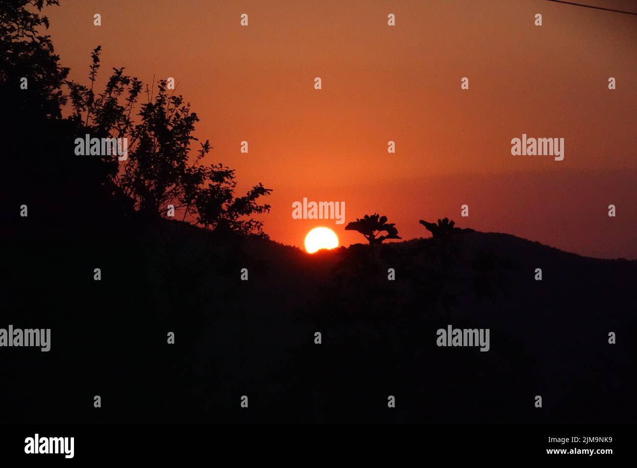 Tramonti e tempeste Foto Stock