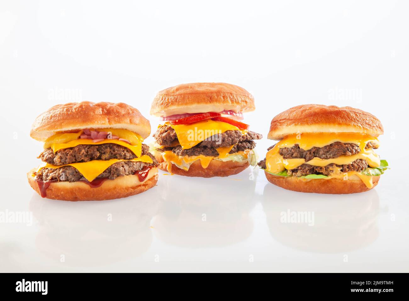 Tre hamburger brioche donut farine Foto Stock