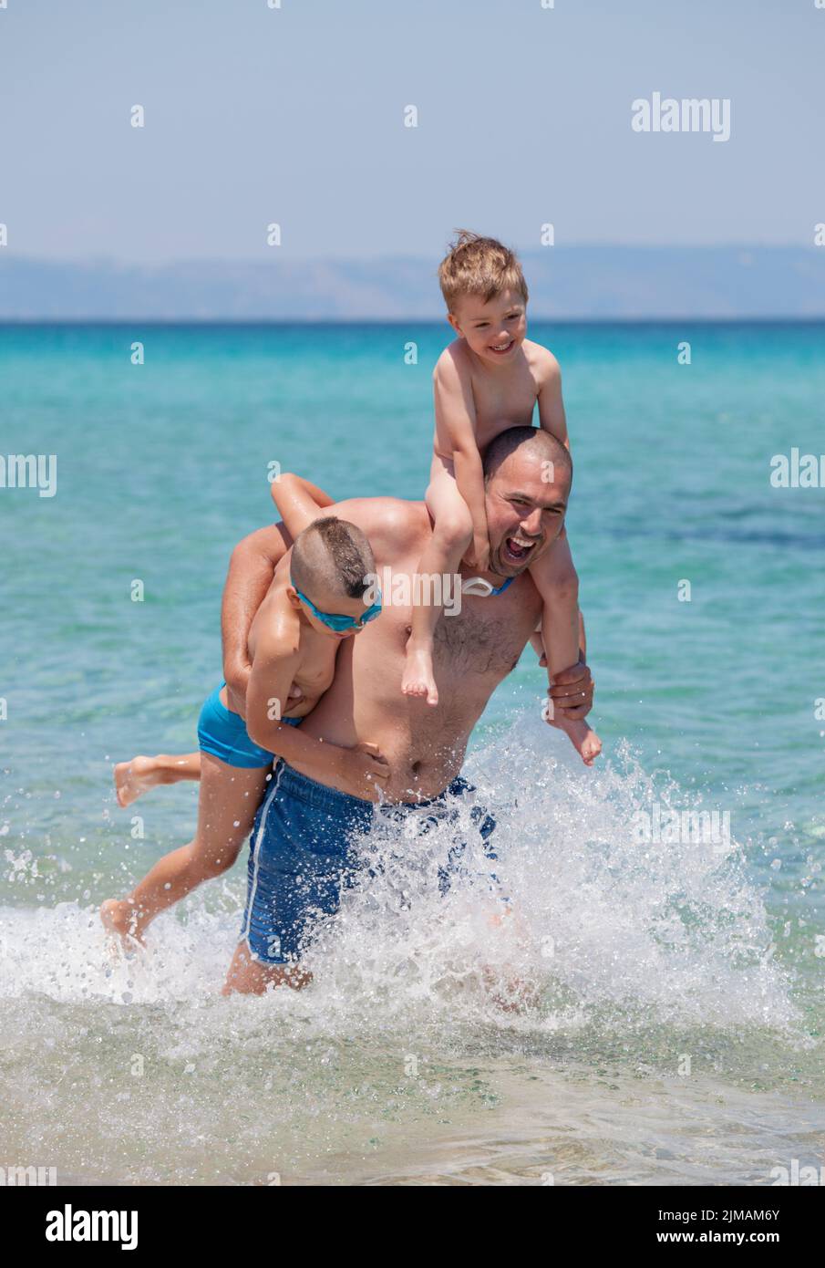 Padre e per il divertimento di tutta la famiglia Seashore Foto Stock