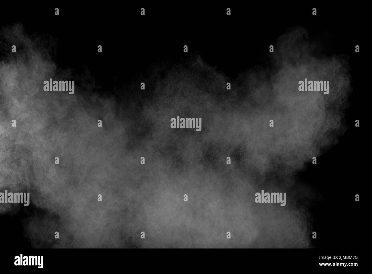 Abstract polvere bianca esplosione su sfondo nero.Abstract polvere bianca espirate. Foto Stock