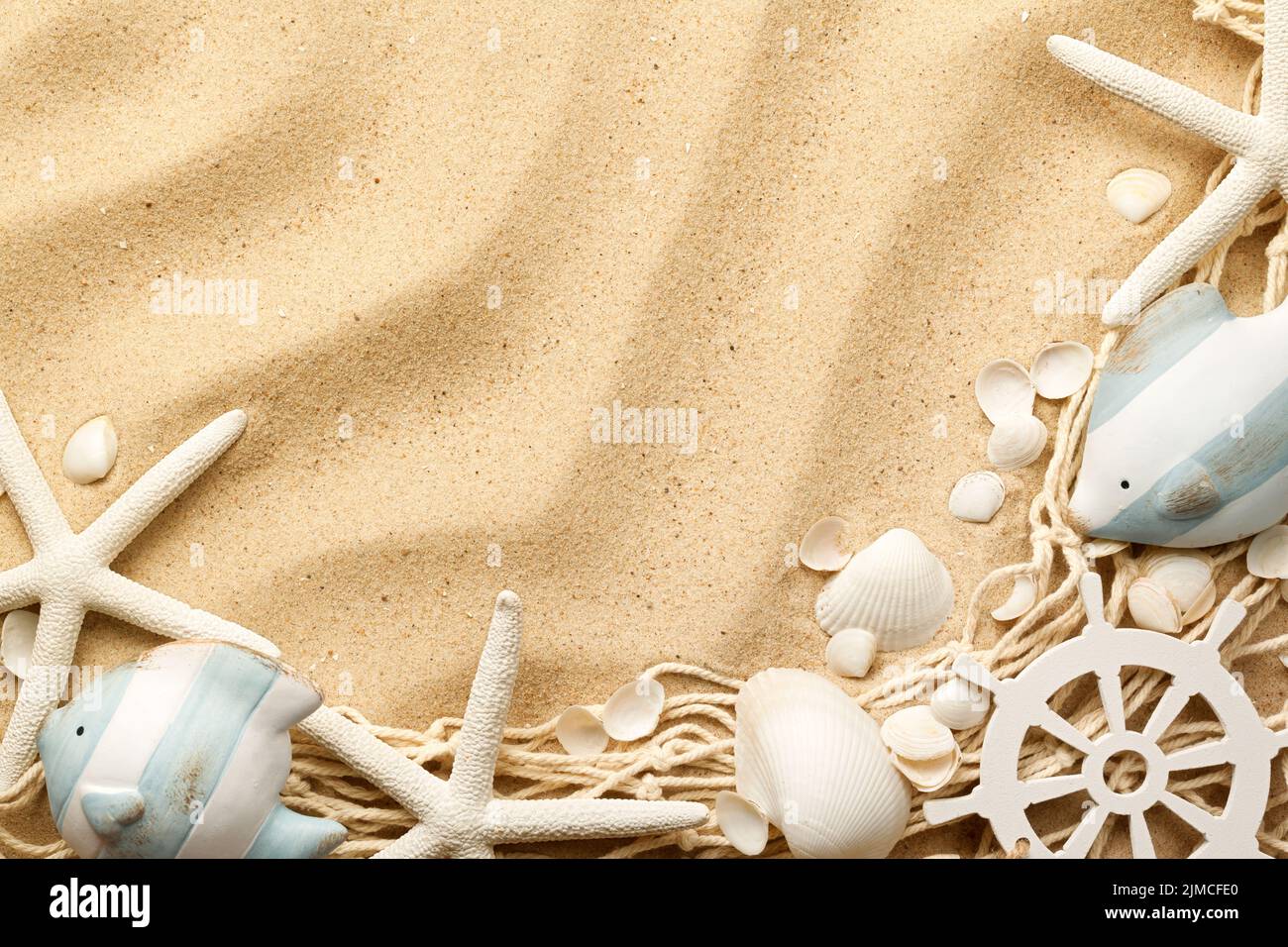 Concetto di vita marina su sfondo di sabbia Foto Stock