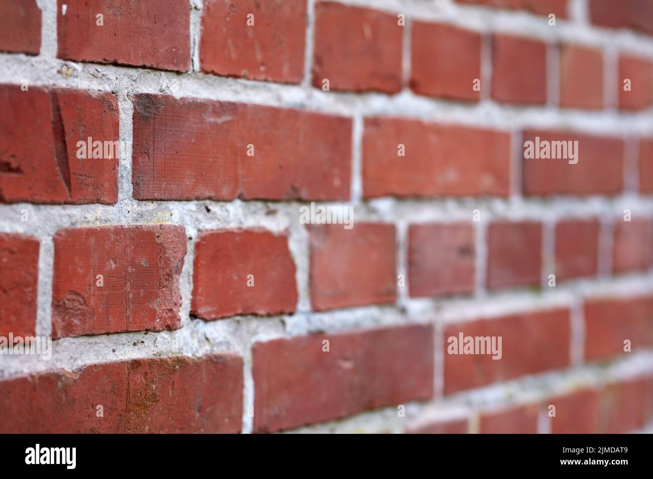 Sfondo. Muro della scuola di 180 anni - sfondo antico e spazio copia. Foto Stock