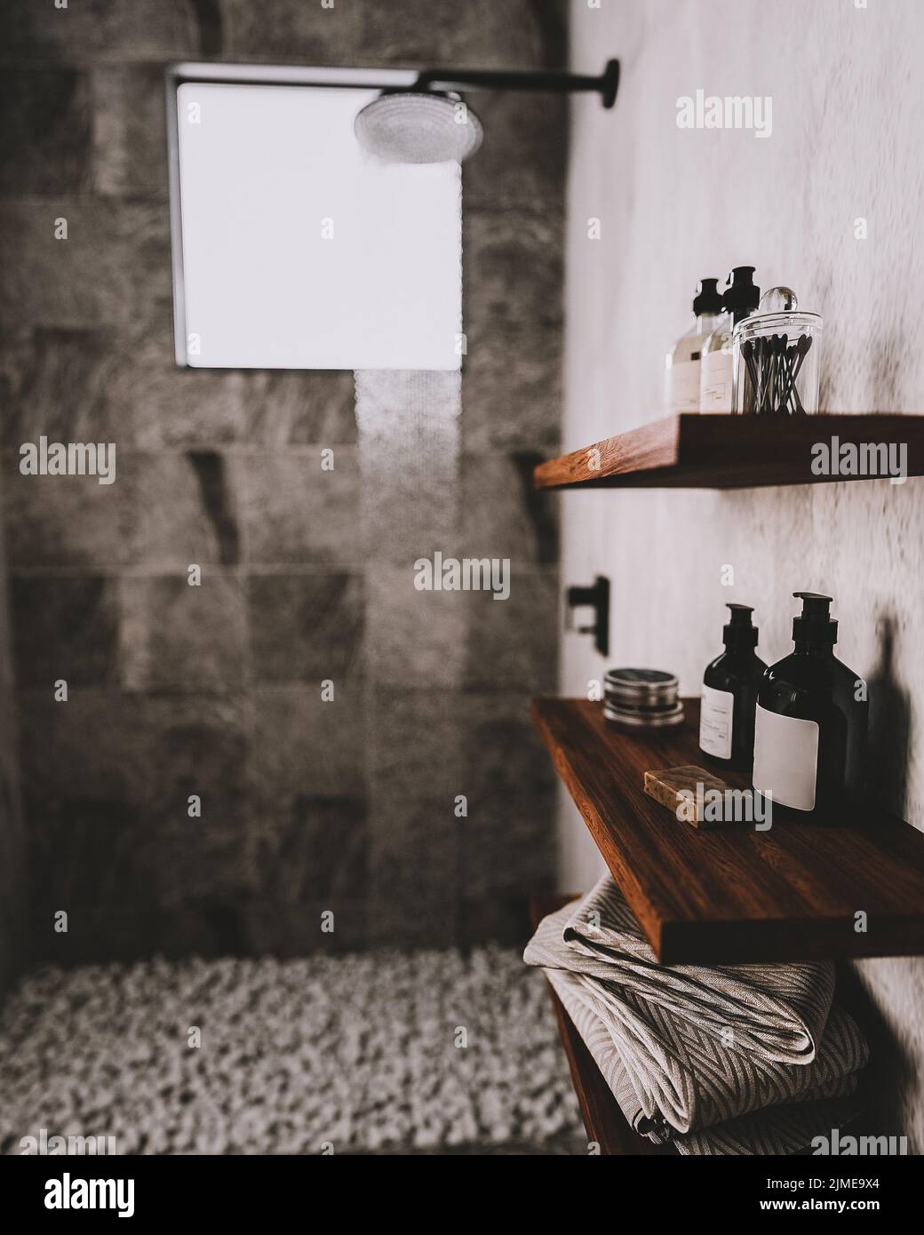 Bagno con ripiani in legno con utensili da bagno e cosmetici in moderno bagno grigio con doccia e ciottoli sul pavimento, contemporaneo Foto Stock