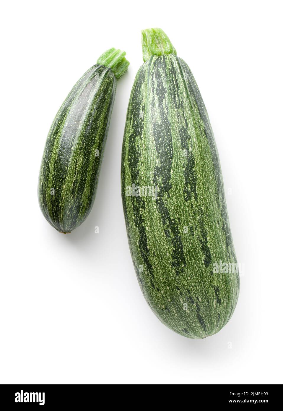 Zucchini organici isolati su sfondo bianco Foto Stock