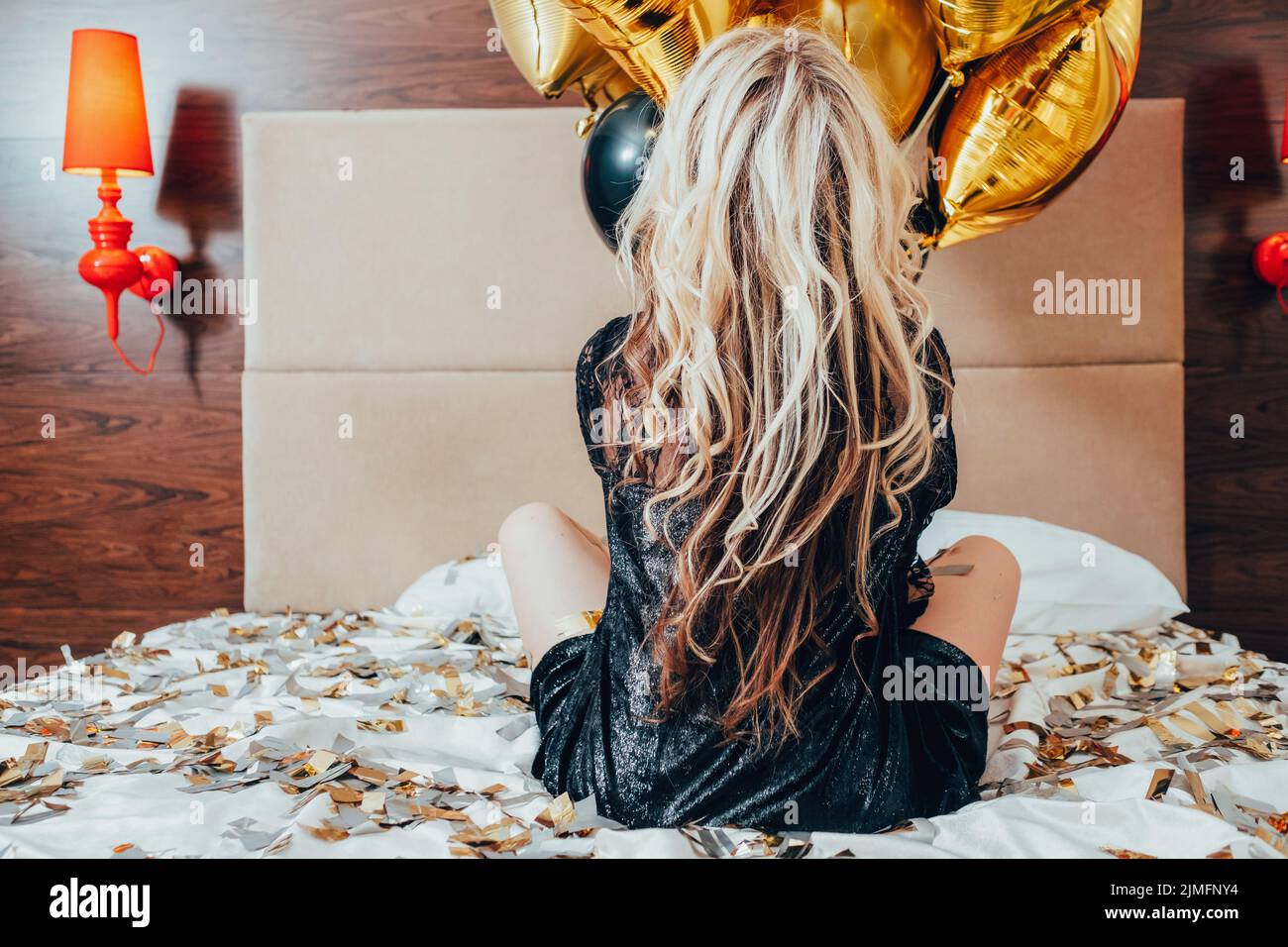 festa libera solo femmina letto confetti palloncini Foto Stock
