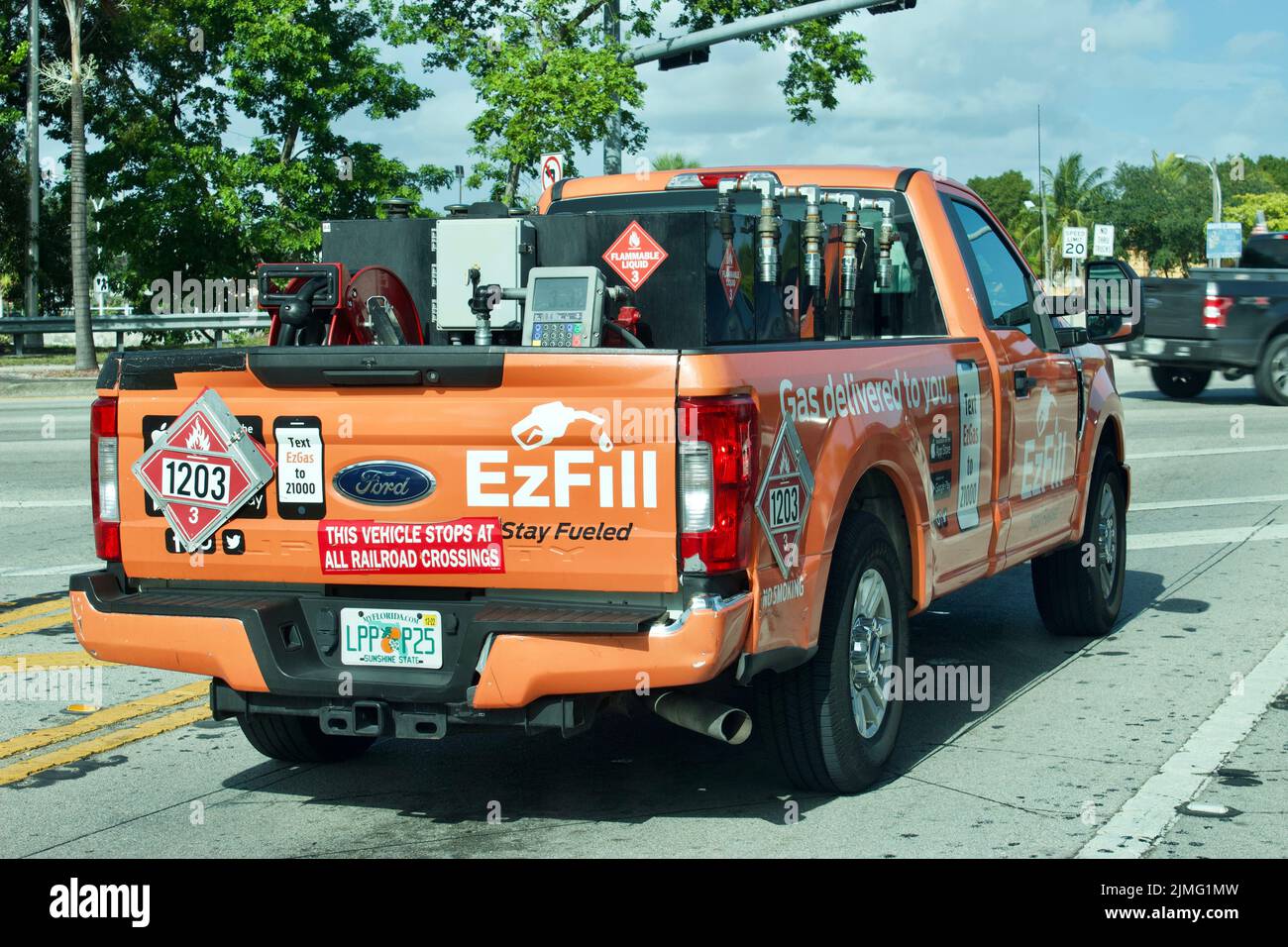 EzFill è un'azienda di fornitura di carburante on-demand nel sud della Florida. Servizi di rifornimento su richiesta, per aziende o abitazioni, direttamente presso la vostra sede. Foto Stock